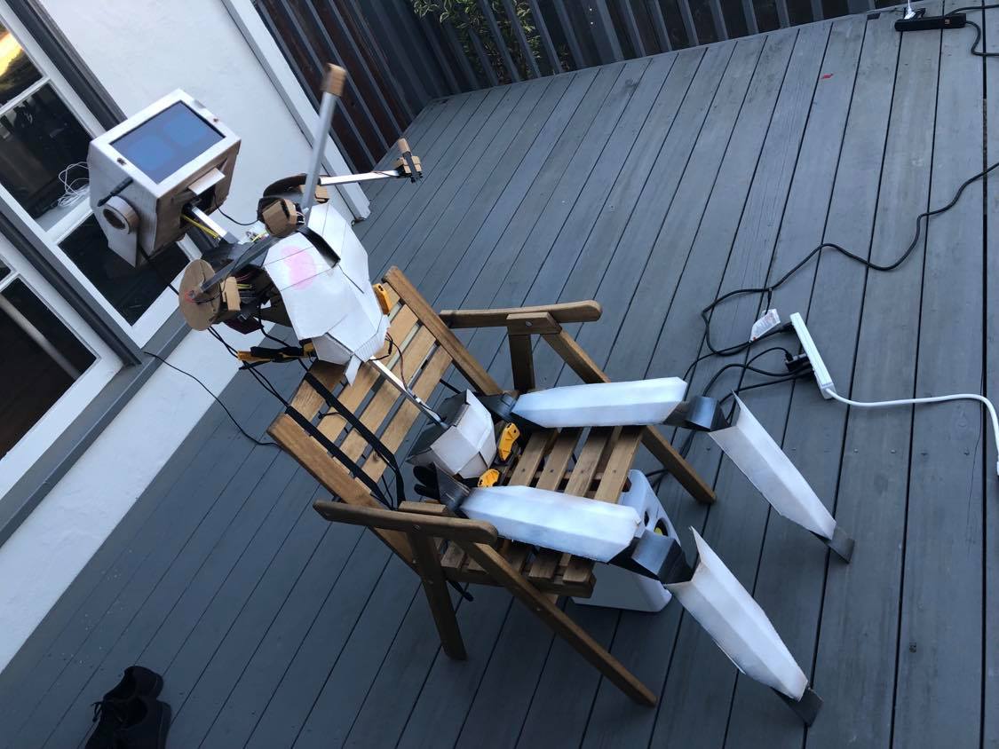 Photo of robotic humanoid sitting in chair